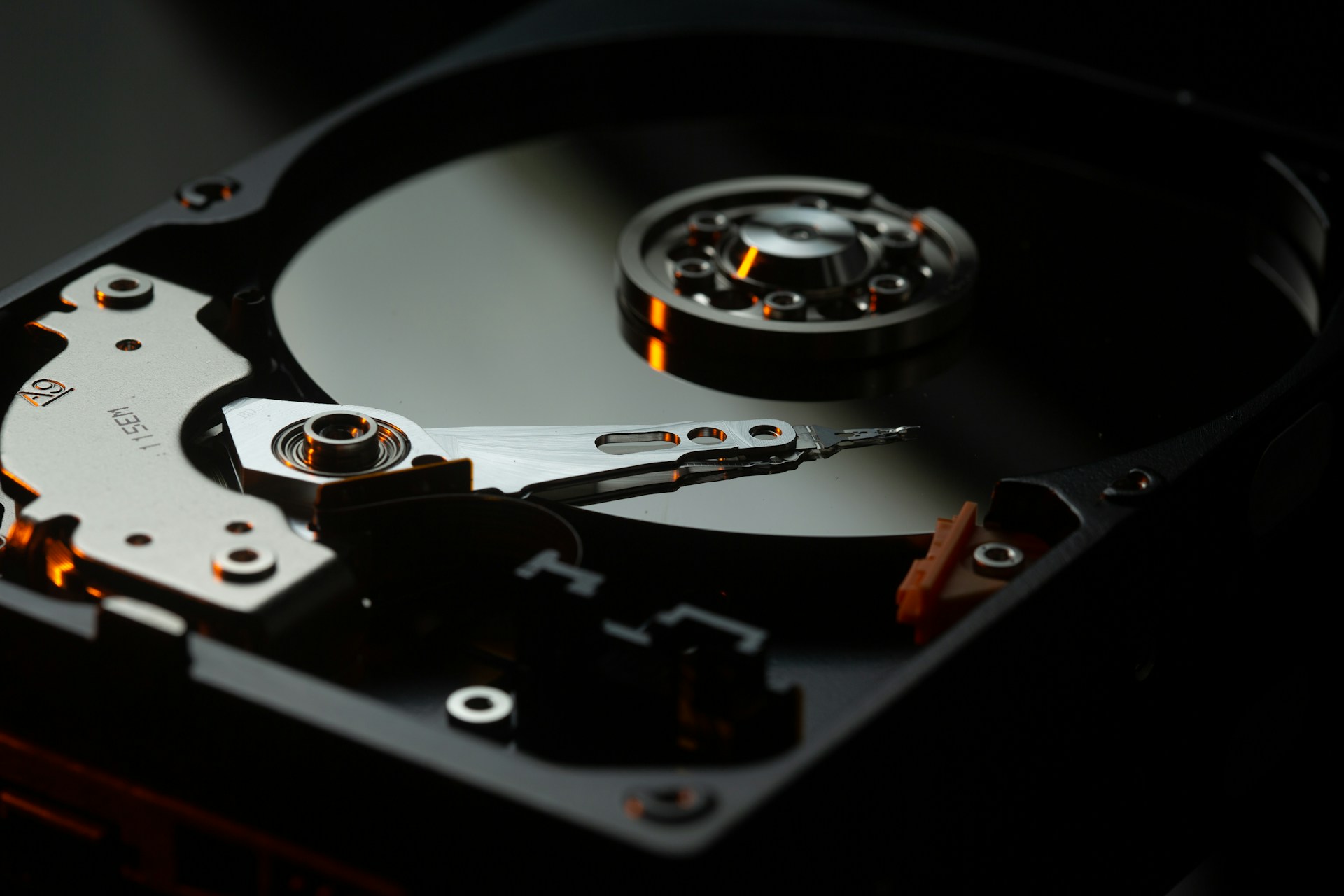 Close-up shot of an internal hard drive.  Photo by benjamin lehman on Unsplash.